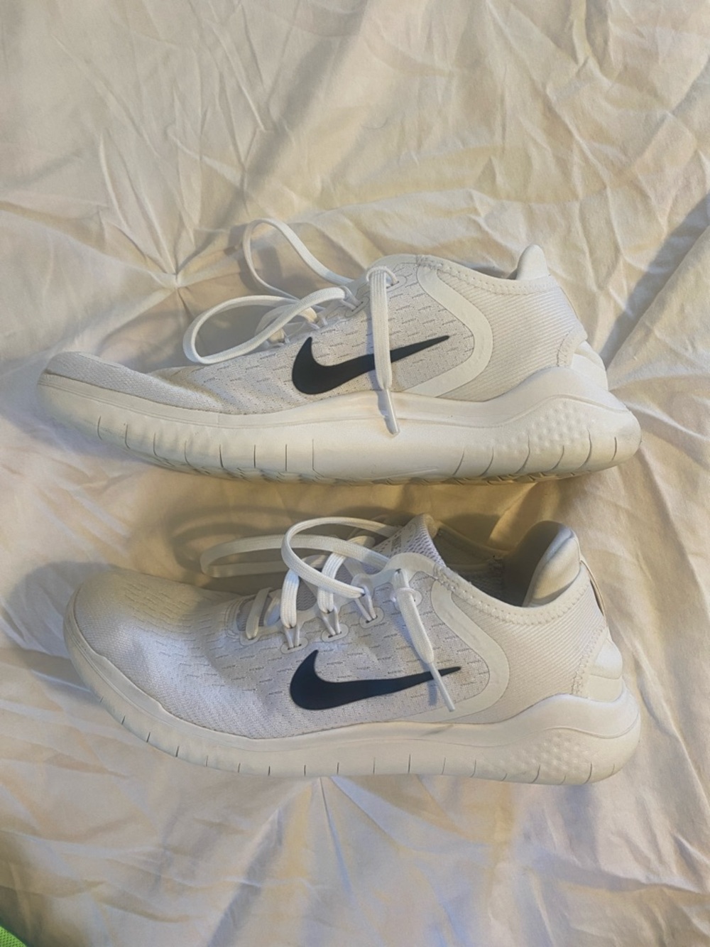 Nike White Athletic Sneakers with Black Swoosh. Womens 9.5 mens 8